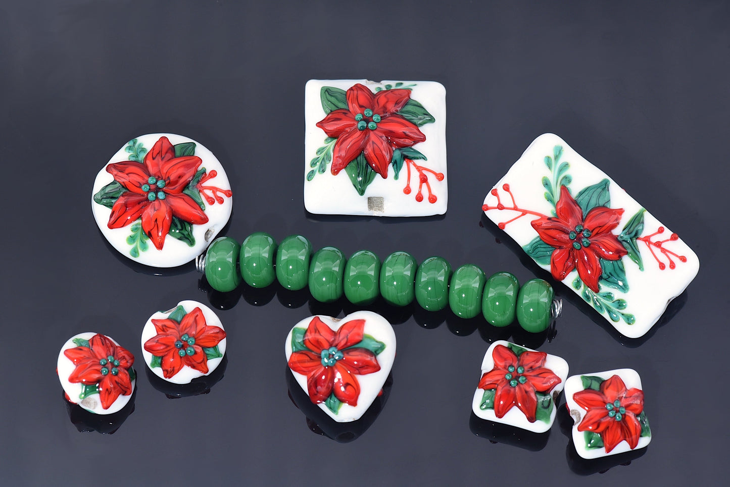 10707814 - Four Red Poinsettia Christmas Pillow Beads