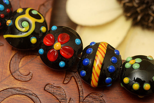 10201202 - Seven Black Based Fiesta Lentil Beads